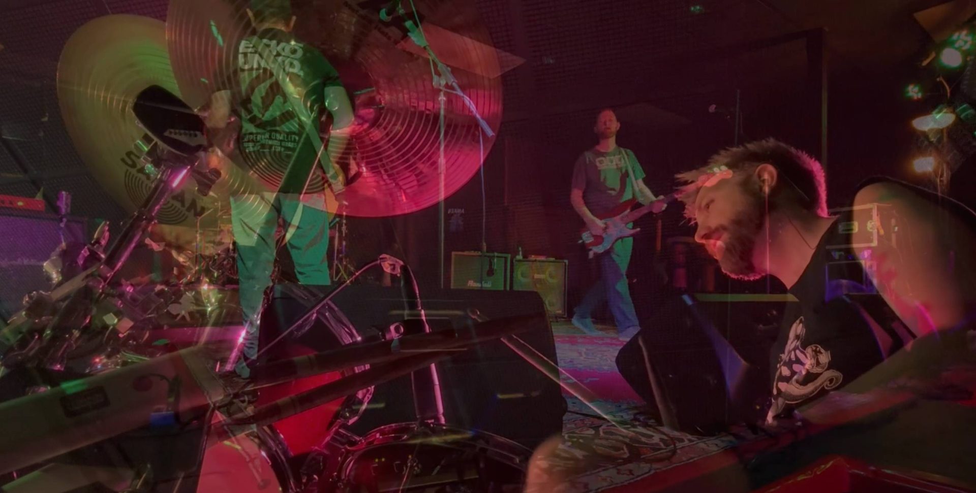 Last Ditch Effort playing live under red and green stage lights